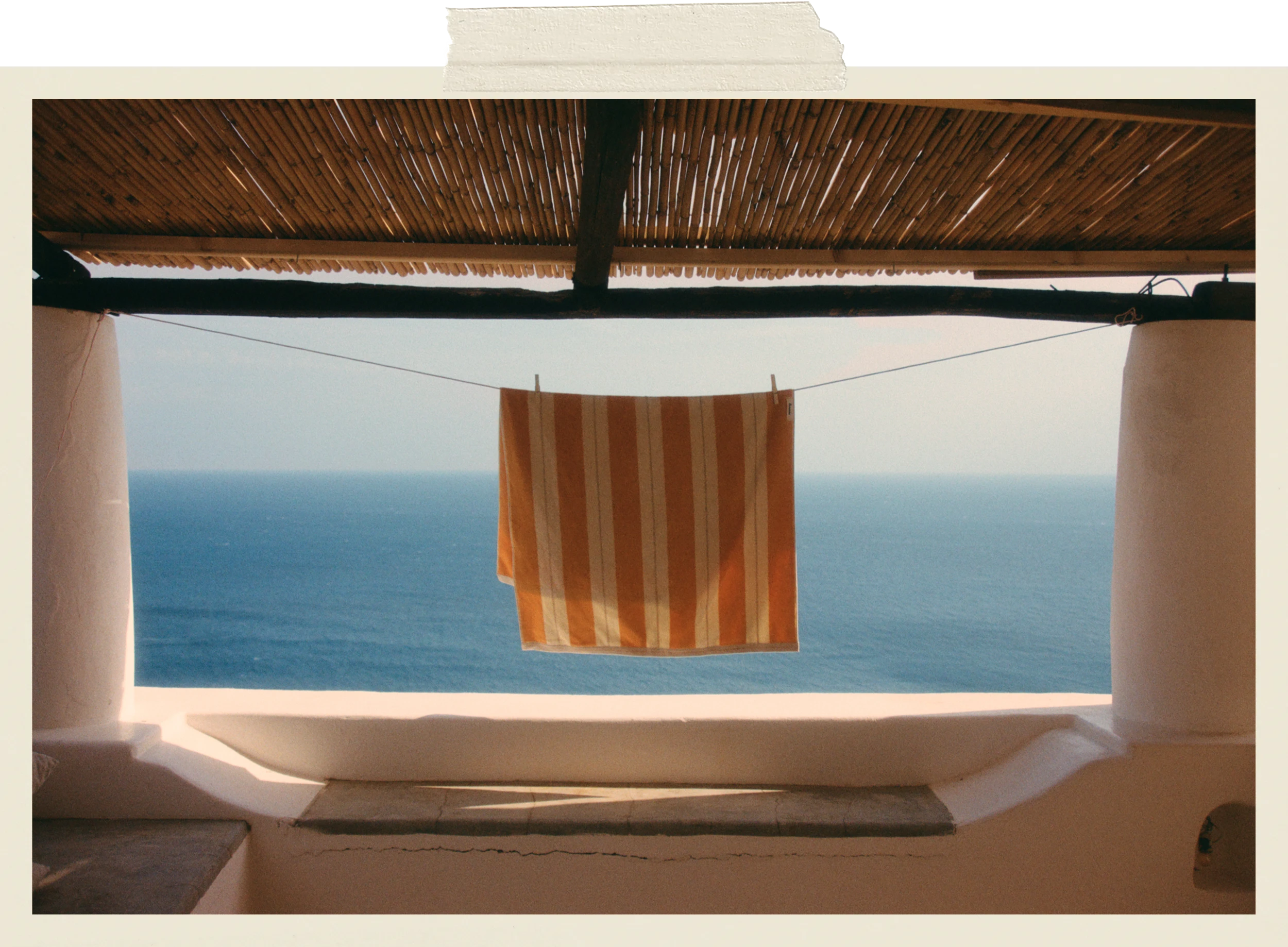 Anne Beach Towel in Tuscan Sun line drying overlooking the Mediterranean Sea.