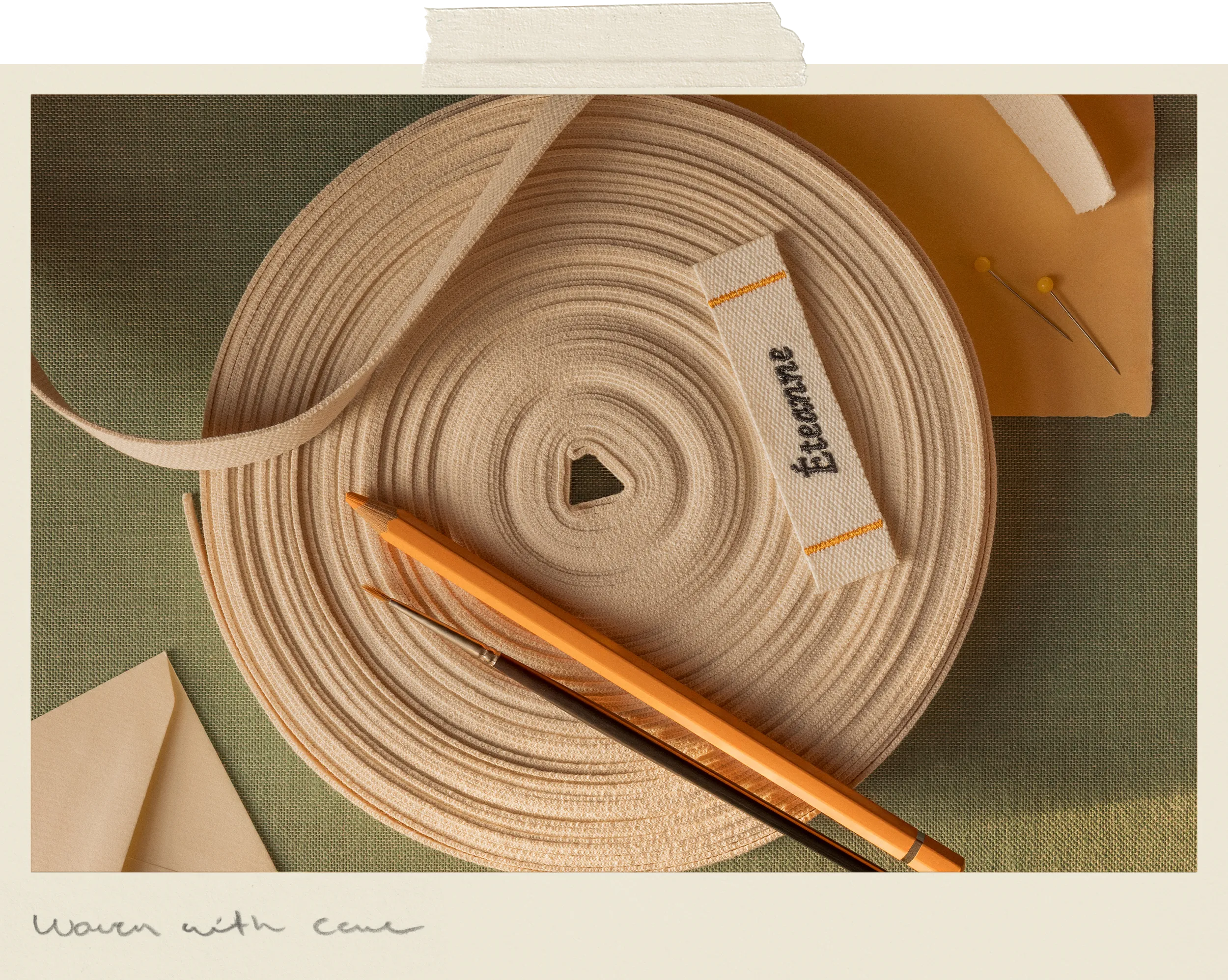 Éteanne woven label with cotton tape and sewing tools