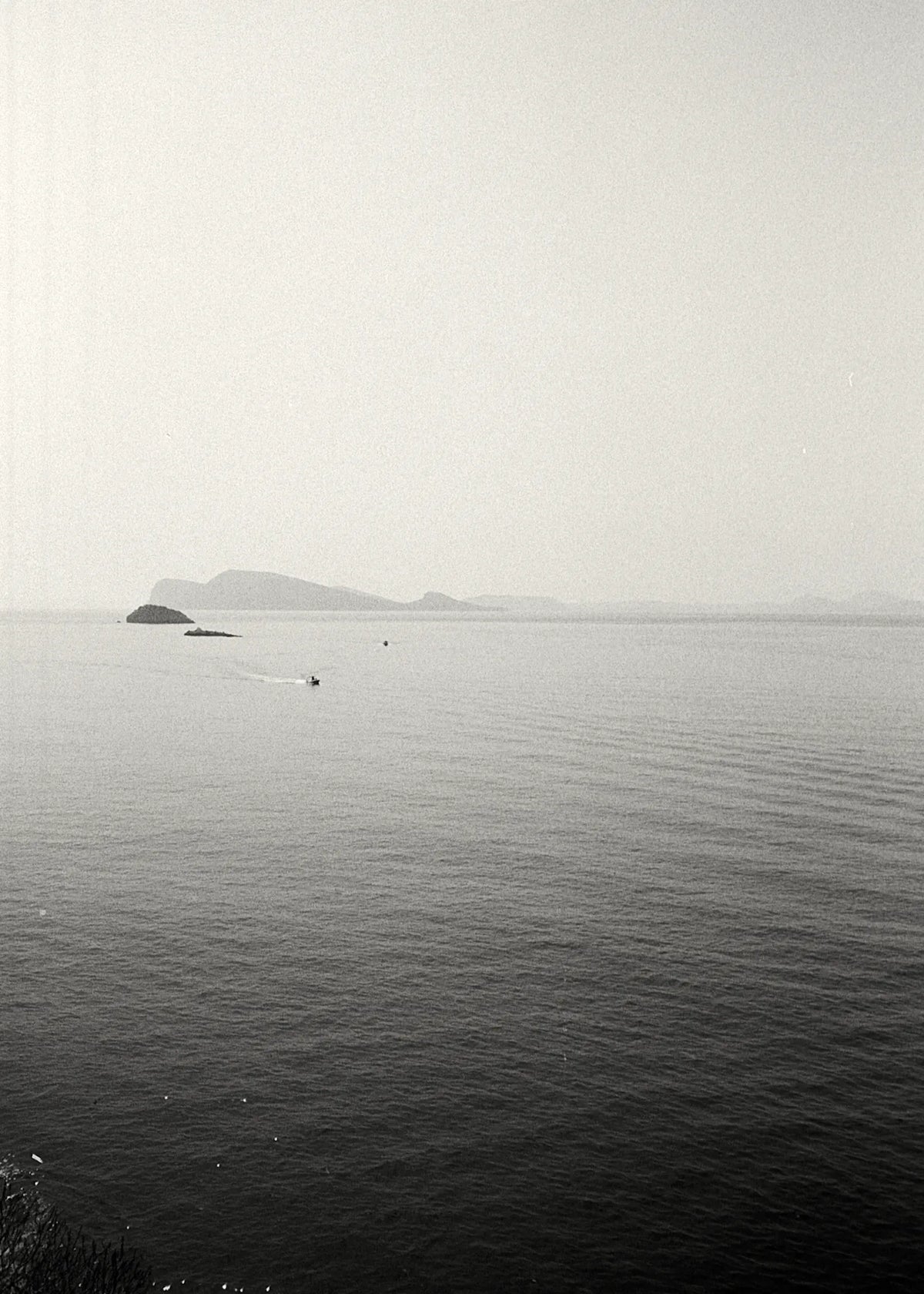 Mediterranean seascape with distant islands photographed by Alexandria Coe