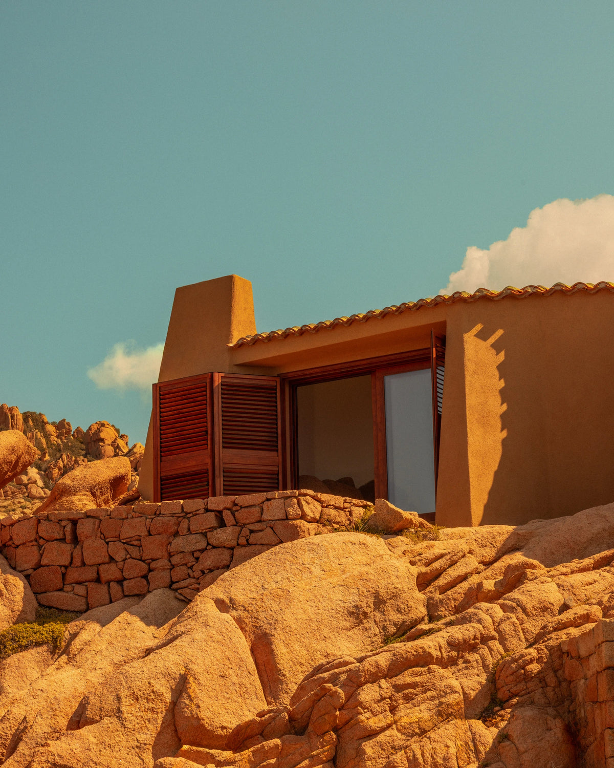 View of Casa Scalesciani overlooking the Mediterranean Sea in Costa Paradiso, Sardinia, photographed for Éteanne.