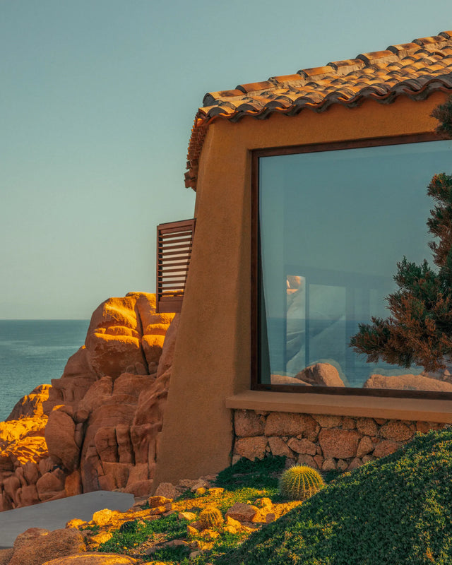 View of Casa Scalesciani overlooking the Mediterranean Sea in Costa Paradiso, Sardinia, photographed for Éteanne